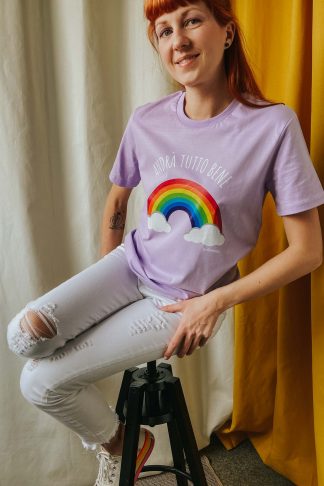 woman wearing lavender tee with rainbow