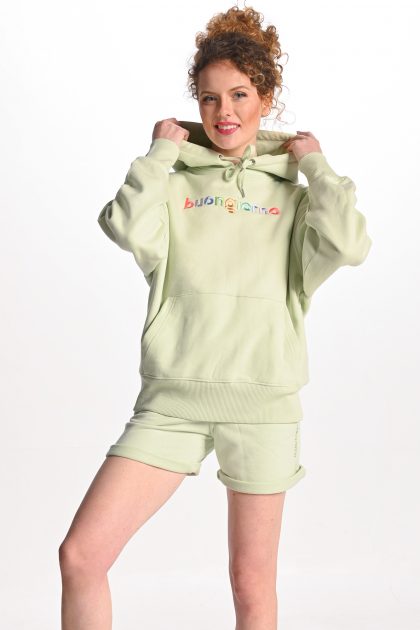 woman wearing light green buongiorno hoodie and green short sweatpants